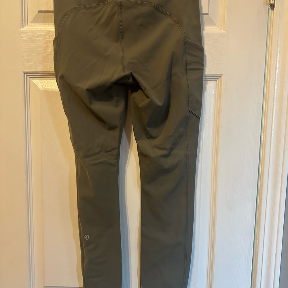 Lululemon leggings with side pockets and back zipper. Only worn twice.